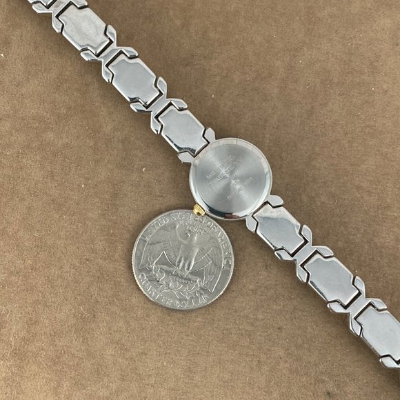 Stunning Armitron Now 2 Tone X Bar Bracelet with a 3/4 Diameter Watch